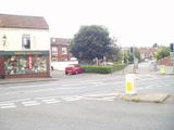 Tram Shed Office block, the junction of Silver Road and Sprowston Road. The building is the one in the background. The lighting shop stood in what had been three shops one of which was Sale the Chemist the nearest pharmacy to Sprowston up until the 1970s.