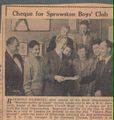 Sprowston Church Boys' Club receives a cheque.