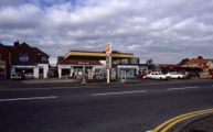 Blenheim Garage / Filling Station and shops on Wroxham Road in 2003. Bugden's first supermarket is still trading before moving to new premises on Blue Boar Lane. This later became TESCO's The garage was also taken over by TESCO’s to become a TESCO Express.