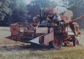An early combine harvester working on White House Farm, Date is thought to be the early 1980s
