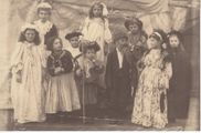 Nellie Edwards 2nd. from left front row as Little Miss Muffett in an Elementary school play. Nellie was born in 1899 and had sister's Bertha and Ethel and a brother Charley. The headmaster of the School was a Mr. Delves.