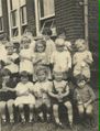 Group of children at Sprowston Infants School on School Lane in 1931. RH end of top row is Ray Cockerday, RH end of middle row is Peter Churchyard